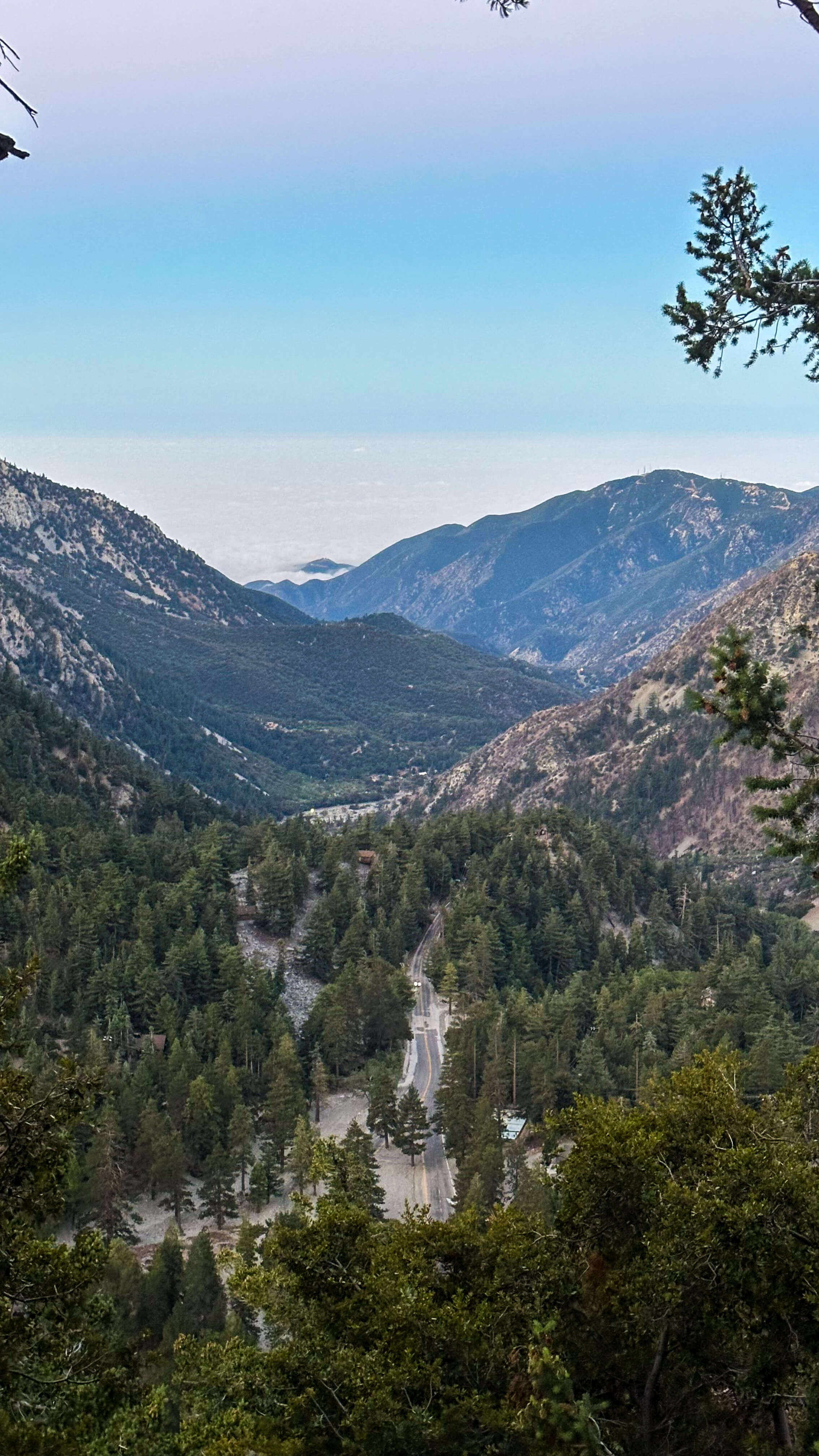 Looking down at the trailhead road from early on the climb